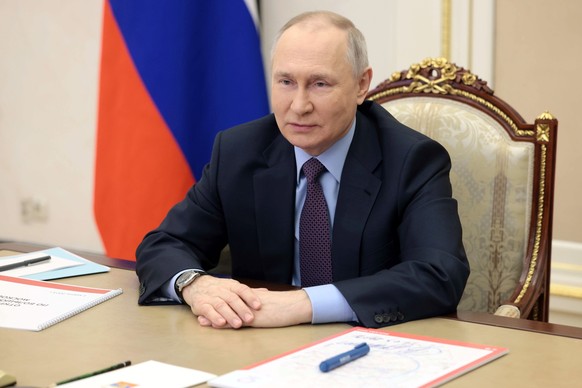 Russian President Vladimir Putin attends the ceremony of opening the Big Circle Line (BCL) of the Moscow Metro (subway) via videoconference in Moscow, Russia, Wednesday, March 1, 2023. (Mikhail Metzel ...