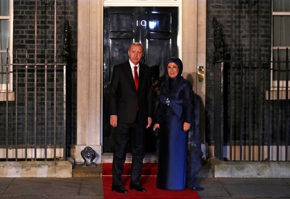 LONDON, UNITED KINGDOM - DECEMBER 3: President of Turkey Recep Tayyip Erdoğan and his wife First Lady of Turkey Emine Erdoğan arrive at 10 Downing Street ahead of a NATO reception hosted by British Pr ...