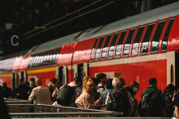 a regional Deutsche Bahn is seen parked at cologne Central station in Cologne, Germany on May 23, 2022 as 9 Euro summer ticket for pulic translportation is available for purchase as Germany tried to e ...