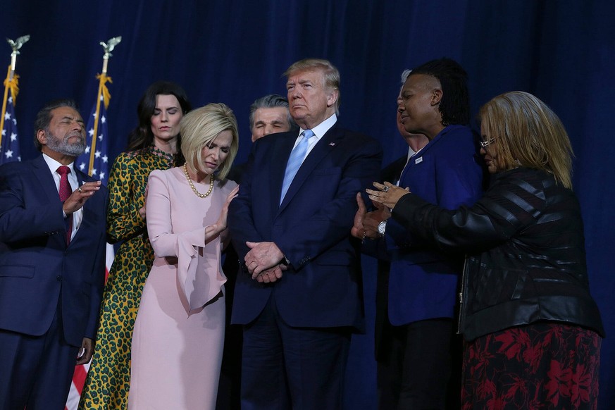 January 3, 2020, Kendall, FL, USA: A group of religious leaders pray for President Donald Trump during an Evangelicals for Trump campaign rally at El Rey Jesus Evangelical church in Kendall, Fla., on  ...