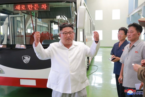 North Korean leader Kim Jong Un visits the Pyongyang Trolley Bus Factory and the Bus Repair Factory in Pyongyang, North Korea in this photo released August 4, 2018 by North Korea&#039;s Korean Central ...