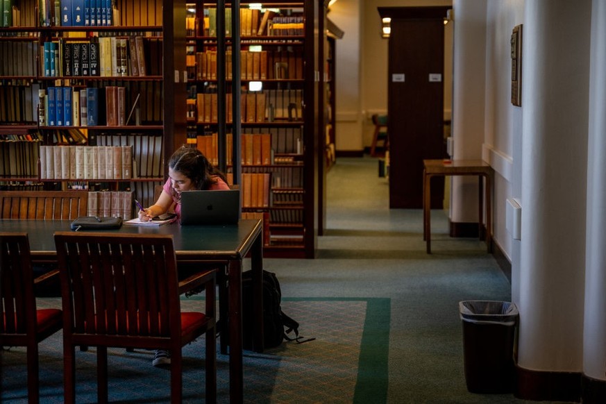 HOUSTON, TEXAS - AUGUST 29: A student studies in the Rice University Library on August 29, 2022 in Houston, Texas. U.S. President Joe Biden has announced a three-part plan that will forgive hundreds o ...