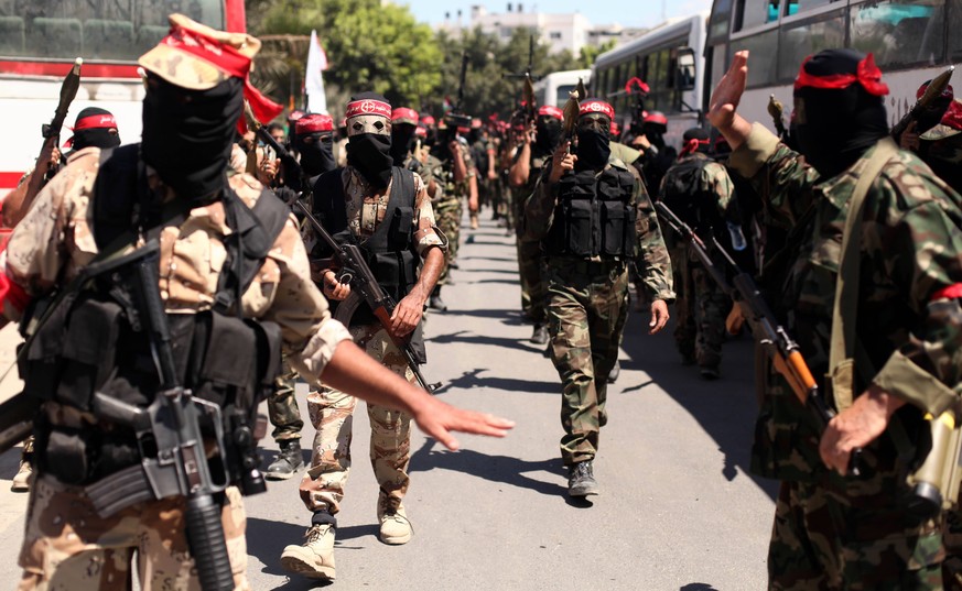 Sept. 2, 2014 - Gaza, gaza strip, Palestine - Palestinian militants from the Popular Front for the Liberation of Palestinian (PFLP) take part in a military show in Gaza City September 2, 2014. An open ...