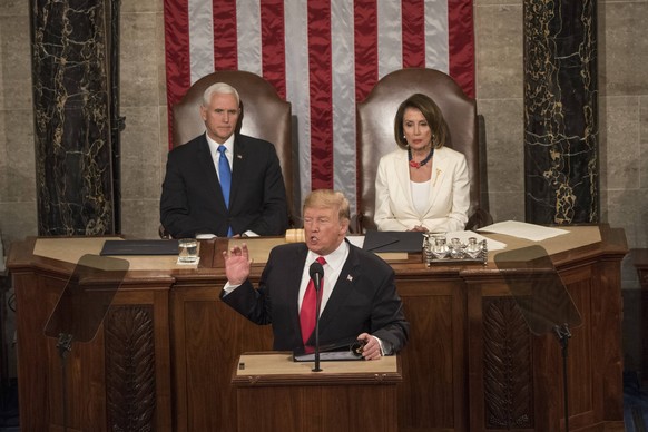 Washington DC, February 5, 2019, USA: President Donald J Trump gives his second State of the Union (SOTU) address as President. House Speaker Nancy Pelosi and Vice President Mike Pence sit behind him  ...