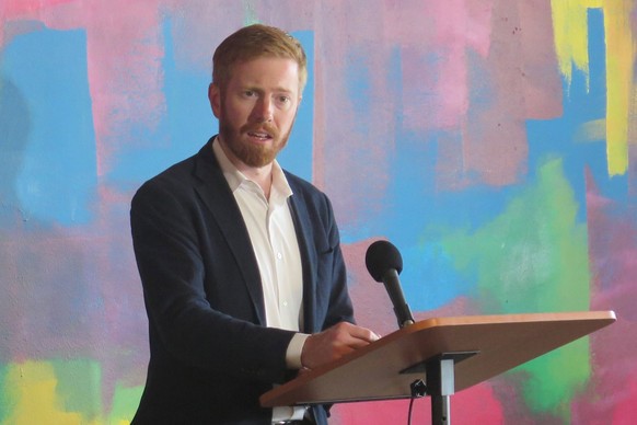 In this July 25, 2022 photo, Michigan&#039;s 3rd District Congressional Republican Rep. Peter Meijer answers questions at the West Michigan Hispanic Chamber of Commerce in Grand Rapids, Mich. ahead of ...