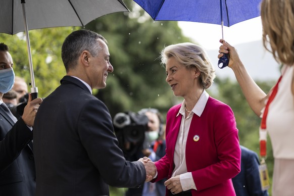 Swiss President Ignazio Cassis, Minister of Foreign Affairs, left, welcomes Ursula Von der Leyen, President of the European Commission, during the Ukraine Recovery Conference URC, Monday, July 4, 2022 ...