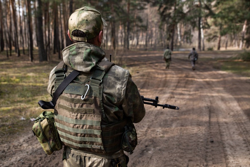 Ukraine-Konflikt, Russische Soldaten in ihren Stellungen bei Kreminna, UKR RUSSIA, LUGANSK PEOPLE S REPUBLIC - MARCH 17, 2023: Members of the BARS-13 Russky Mir volunteer battalion of the Russian Army ...