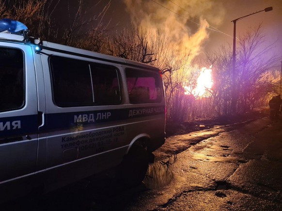 8120058 19.02.2022 A view shows a fire on the site of an explosion in the Kamennobrodsky district of Lugansk, self-proclaimed Luhansk People&#039;s Republic, Eastern Ukraine. Sputnik