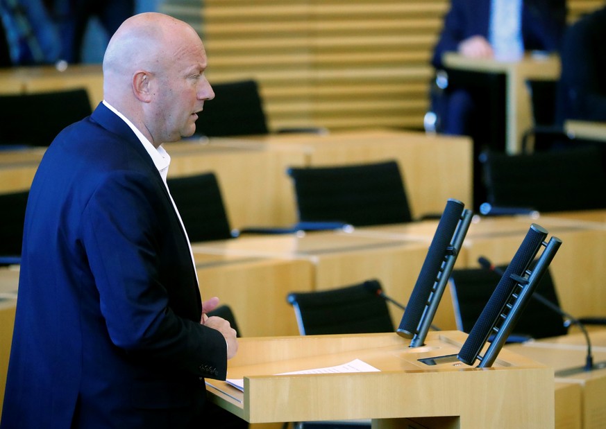 New elected Free Democratic Party FDP premier Thomas Kemmerich addresses the parliament after he was elected new Thuringia premier in Erfurt, Germany, February 5, 2020. REUTERS/Hannibal Hanschke