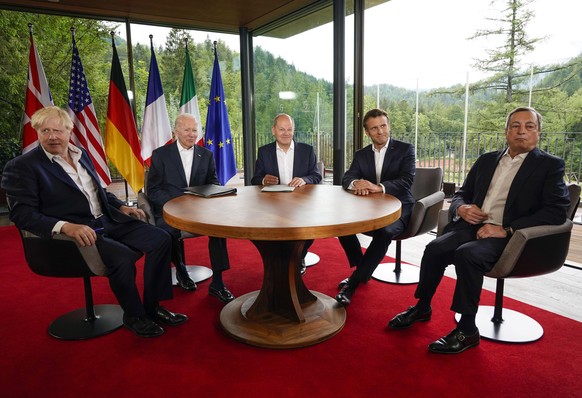 G7 leaders from left, British Prime Minister Boris Johnson, U.S. President Joe Biden, German Chancellor Olaf Scholz, French President Emmanuel Macron and Italy's Prime Minister Mario Draghi meet on th ...