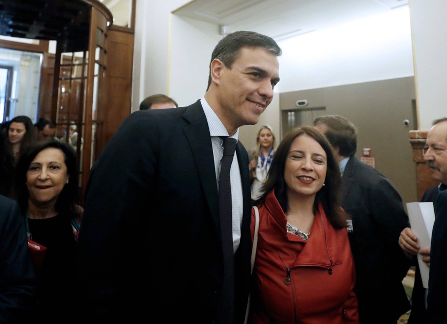 Leader of Spanish Workers Socialist Party (PSOE), Pedro Sanchez (C) (L), arrive to the Chamber for the second day of the no-confidence motion debate against Spanish Prime Minister Mariano Rajoy at the ...