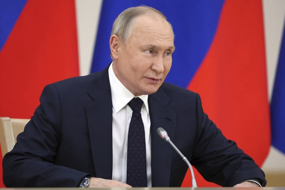 Russian President Vladimir Putin speaks during a meeting with judges of the Constitutional Court of the Russian Federation marking the national holiday celebrated on December 12 - Constitution Day, at ...