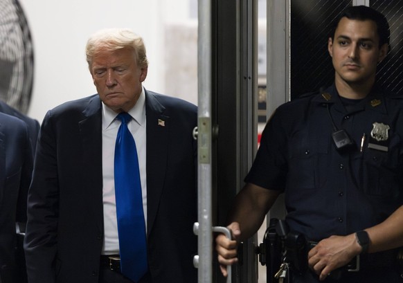 Former President Donald Trump returns to the courtroom to hear the verdict in his criminal trial at Manhattan Criminal Court in New York on Thursday, May 30, 2024. Jurors have begun their deliberation ...