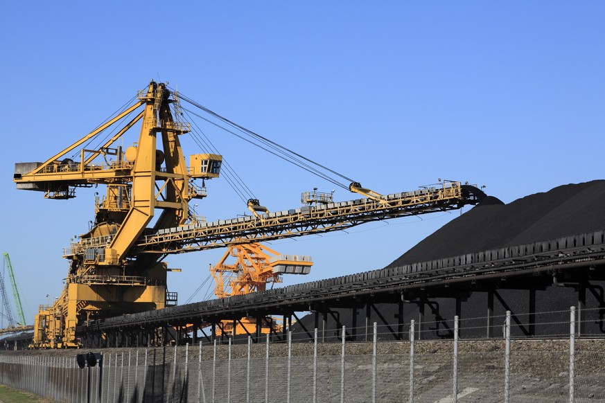 a huge coal loading conveyor belt piles coal. Kooragang Island, Newcastle, NSW, Australia