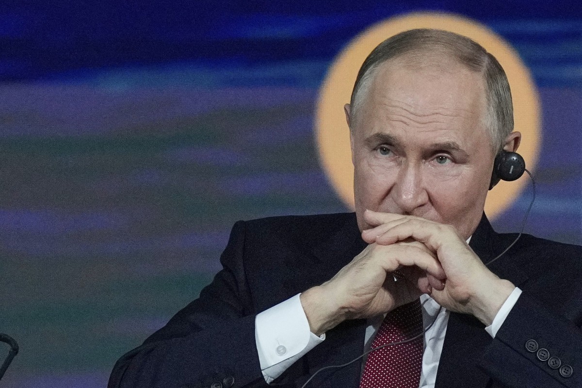 Russian President Vladimir Putin attends a plenary session of the St. Petersburg International Economic Forum in St. Petersburg, Russia, on Friday, June 20, 2025. (AP Photo/Dmitri Lovetsky)
