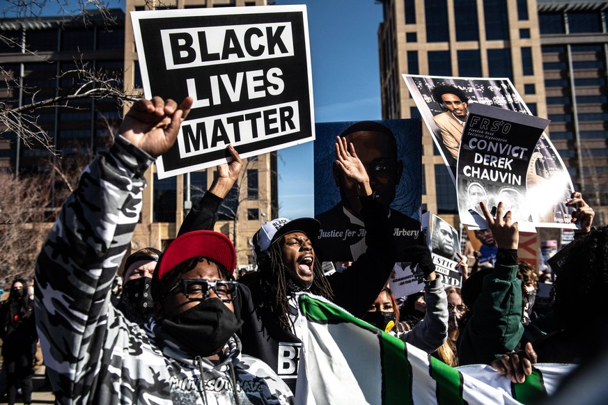 March 8, 2021, Minneapolis, Minnesota, USA: MINNEAPOLIS, MN - MARCH 08: General view of the protests during the civil rights march outside the Hennepin County Government Center on March 8, 2021 in Min ...