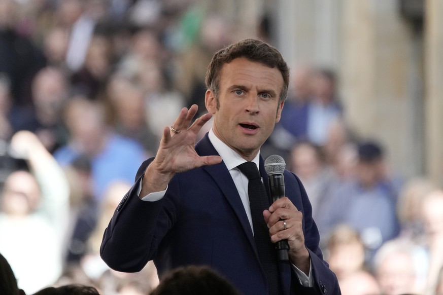 Centrist candidate and French President Emmanuel Macron speaks during a campaign rally Friday, April 22, 2022 in Figeac, southwestern France. Emmanuel Macron is facing off against far-right challenger ...