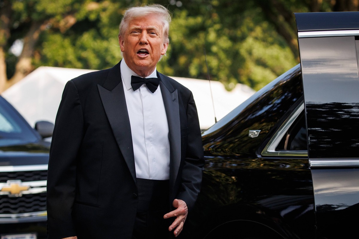 U.S. President Trump stops before getting into the Beast with First Lady Melania Trump not pictured as they head to the opening night of Les Miserables at the Kennedy Center on Wednesday, June 11, 202 ...