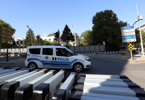 A police car is parked in front of the U.S. Embassy in Ankara, Turkey August 20, 2018. REUTERS/Tumay Berkin