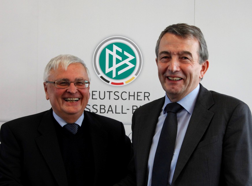 FILE PHOTO: Wolfgang Niersbach (R), general secretary of the German soccer association (DFB) and designated successor of DFB president Theo Zwanziger (L) smile after a news conference at the DFB headq ...