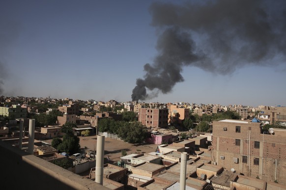 Smoke is seen in Khartoum, Sudan, Wednesday, April 19, 2023. Terrified Sudanese are fleeing their homes in the capital Khartoum, witnesses say, after an internationally brokered cease-fire failed and  ...