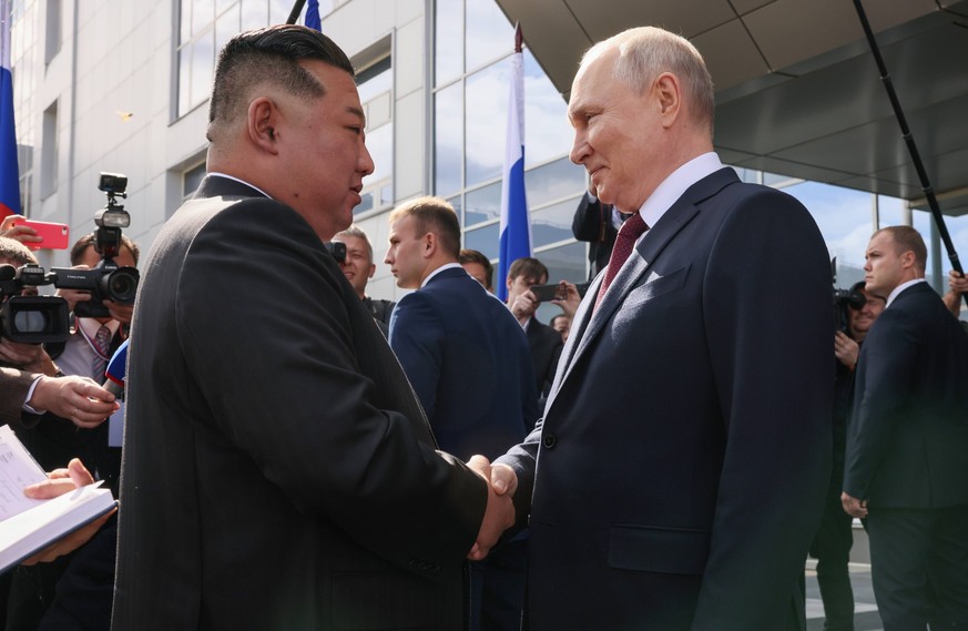 Russia Putin Far Eastern Federal District 8516593 13.09.2023 Russian President Vladimir Putin and North Korean leader Kim Jong Un shake hands during a visit to the Vostochny cosmodrome in Amur region, ...