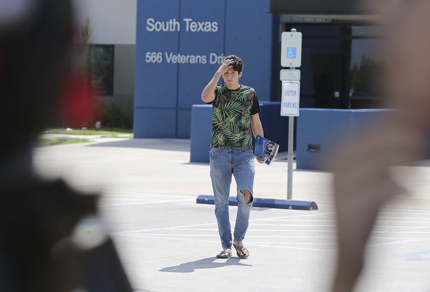 U.S. citizen Francisco Galicia, 18, walks out on his own from the South Texas Detention Facility in Pearsall, Texas, Tuesday, July 23, 2019. Galicia who was born in the U.S. has been released from imm ...