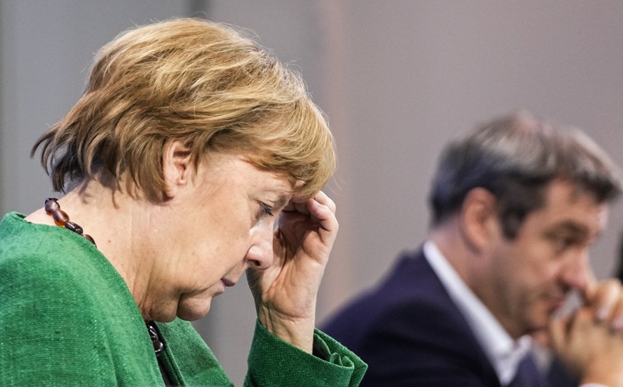 23.03.2021, Berlin: Bundeskanzlerin Angela Merkel (CDU), und Bayerns Ministerpr
