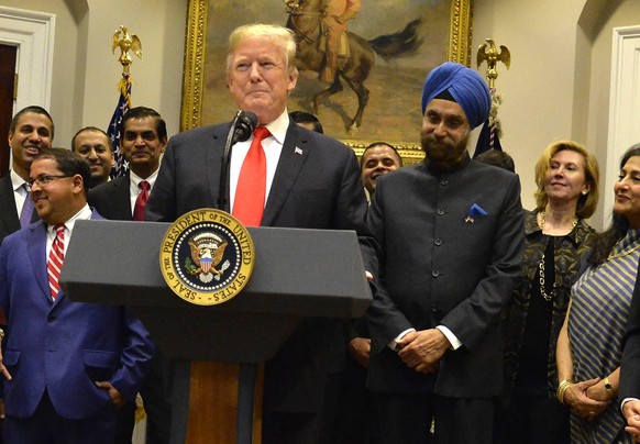 Deputy National Security Advisor Mira Ricardel (background, R) is present as President Donald Trump attends a November 13, 2018 Diwali Festival of Lights ceremony, at the White House, in Washington, D ...