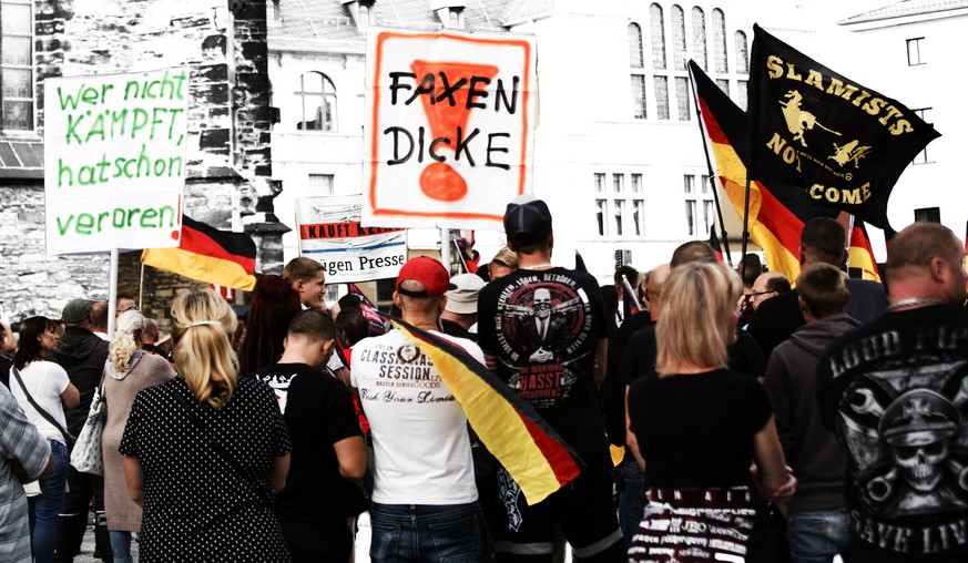 KOETHEN, GERMANY - SEPTEMBER 16: Protesters gather to participate in a march organized by the right-wing AfD political party as well as the right-wing Pegida and &quot;Zukunft Heimat&quot; movements t ...