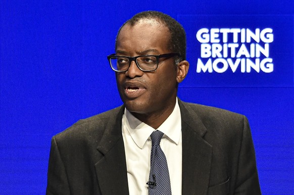 Britain's Chancellor of the Exchequer Kwasi Kwarteng speaks at the Conservative Party conference at the ICC in Birmingham, England, Monday, Oct. 3, 2022. The British government has dropped plans to cu ...