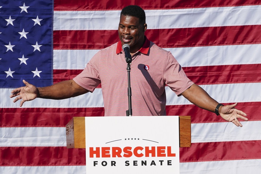 Republican candidate for U.S. Senate Herschel Walker speaks during a campaign stop in Cumming, Ga., Thursday, Oct. 27, 2022. (AP Photo/John Bazemore)