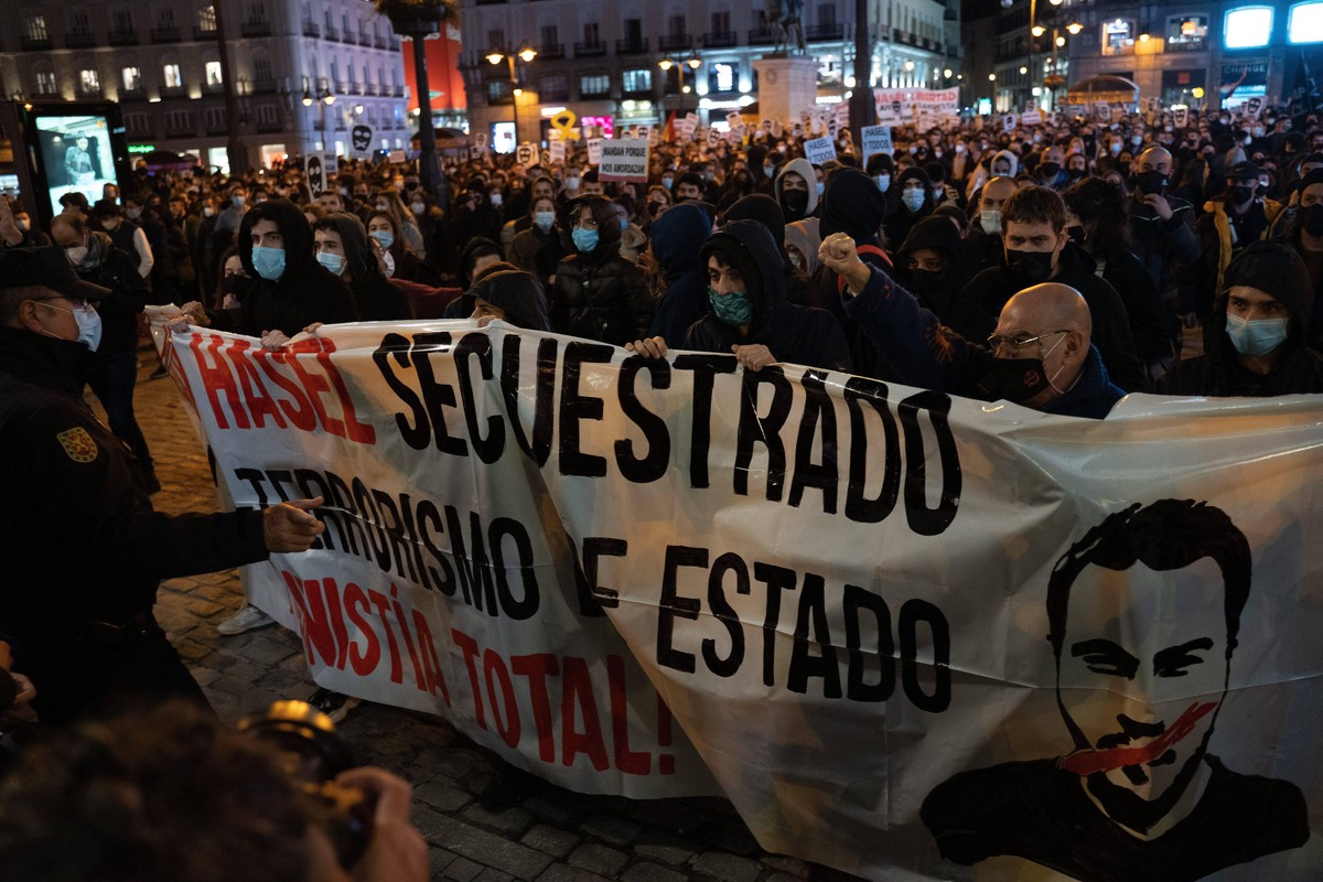 Protesters throw stones towards the the police officers during the demonstration. Pablo Hasl, a Catalan rapper, was arrested on a Tuesday morning, February 16 and was sentenced to nine months and one ...