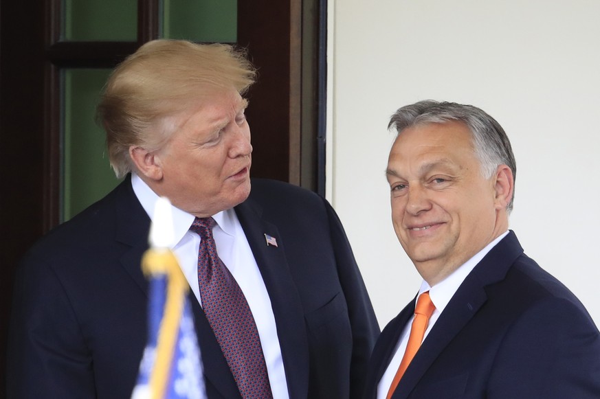 FILE - President Donald Trump welcomes Hungarian Prime Minister Viktor Orban to the White House in Washington, on May 13, 2019. Orban, tweeted a message of support for former U.S. President Donald Tru ...