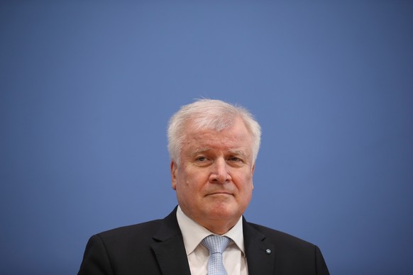 BERLIN, GERMANY - MARCH 12: Chairman of the Bavarian Christian Democrats (CSU) Horst Seehofer, along with German Chancellor and Chairwoman of the German Christian Democrats (CDU) Angela Merkel and Act ...