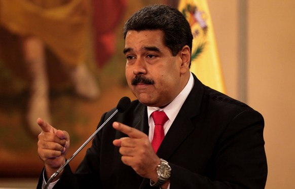 (180805) -- CARACAS, Aug. 5, 2018 -- Venezuela s President Nicolas Maduro speaks during a nationally televised address from the Miraflores Palace in Caracas, capital of Venezuela, Aug. 4, 2018. Nicola ...