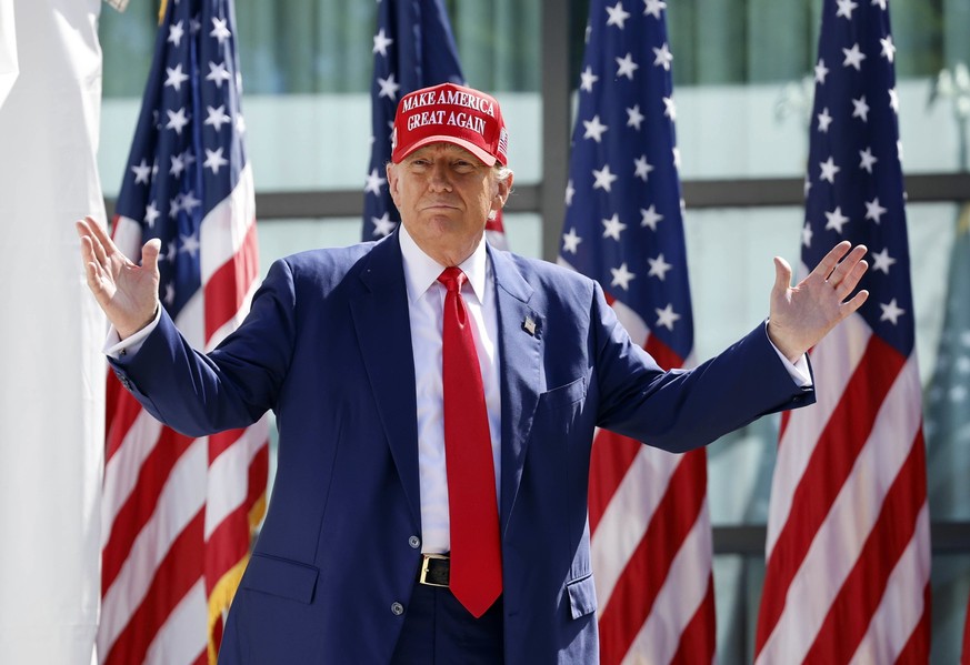 FILE - Republican presidential candidate former President Donald Trump enters at a campaign event, June 18, 2024, in Racine, Wis. Former President Donald Trump&#039;s sentencing in his hush money case ...