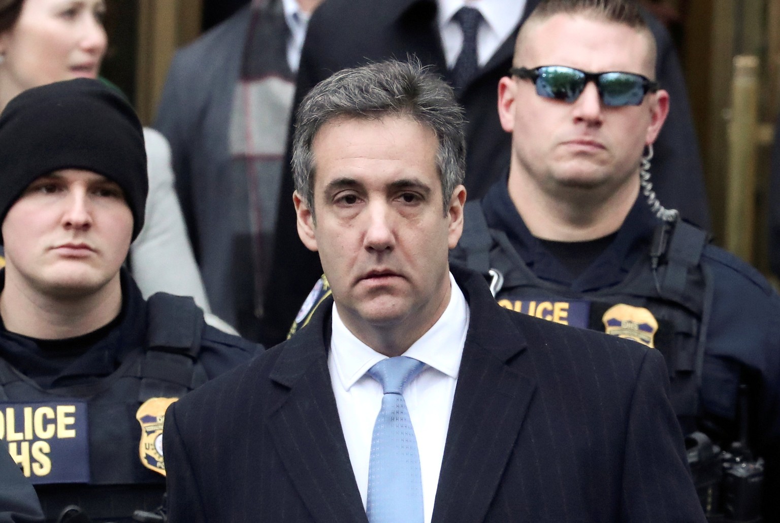 FILE PHOTO: Michael Cohen, U.S. President Donald Trump&#039;s former attorney, exits the United States Court house after his sentencing, in the Manhattan borough of New York City, New York, U.S., Dece ...