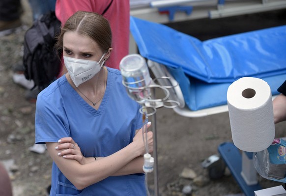 Children s Hospital Hit As Russian Strikes Kill Dozens - Kyiv A healthcare provider in a respirator is pictured during a response effort at the Ohmatdyt National Specialized Childrens Hospital attacke ...