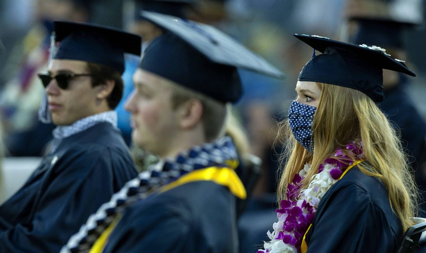 June 13, 2020, Temecula, California, USA: Social distancing was a must but masks were optional for students as part of the graduation ceremony on campus at Linfield Christian School in Temecula on Sat ...