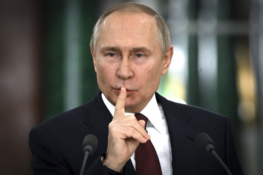 FILE - Russian President Vladimir Putin gestures while speaking at a news conference following a meeting of the State Council at the Kremlin in Moscow, Russia, on Thursday, Dec. 22, 2022. Treason case ...