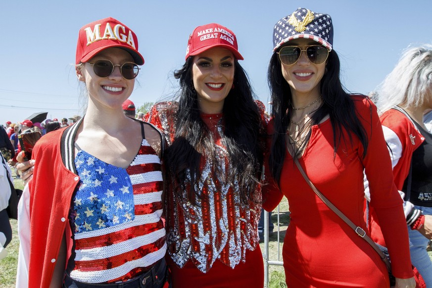 March 25, 2023, Waco, Texas, USA: Three female Trump supports pose for a group portrait during the ex-president s first campaign rally for the 2024 Presidential election at Waco s Regional Airport in  ...