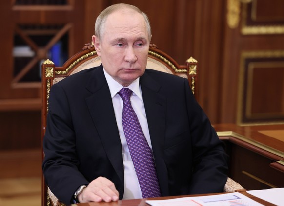 Russia Putin 8351566 06.01.2023 Russian President Vladimir Putin is seen during a meeting with Promsvyazbank CEO Pyotr Fradkov at the Kremlin in Moscow, Russia. Mikhail Klimentyev / Sputnik Moscow Rus ...