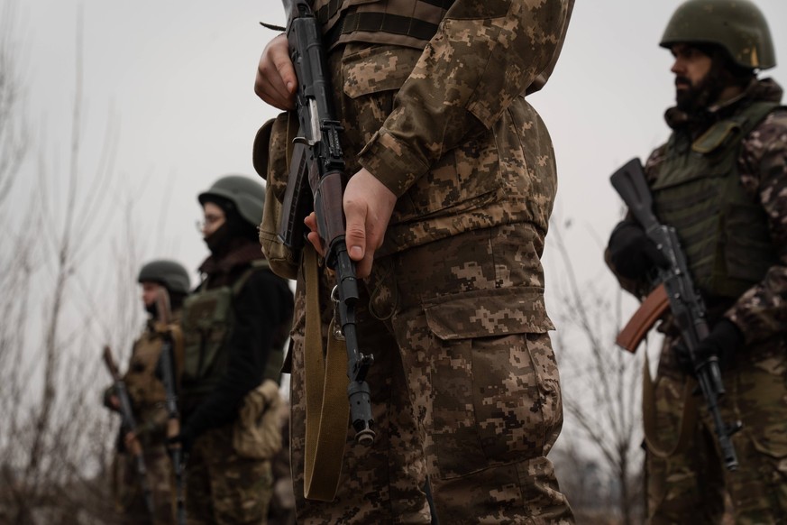 March 15, 2024, Kyiv, Ukraine: Trainees hold their rifle in a training organised by the third separate assault brigade in Kyiv region. Ukraine is facing a shortage of ammunition and military personnel ...