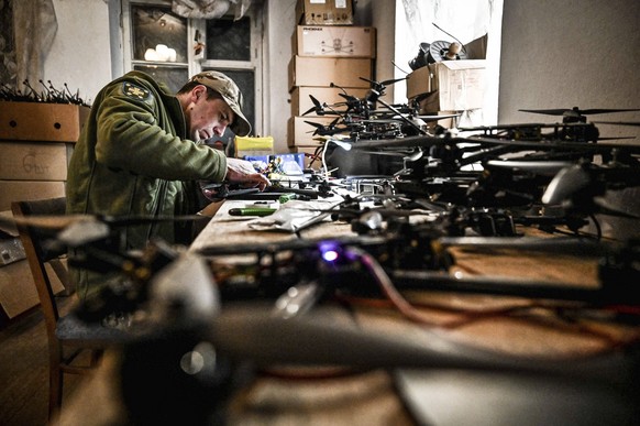 ZAPORIZHZHIA REGION, UKRAINE - MARCH 08, 2024 - A serviceman assembles a reusable bomber drone, Zaporizhzhia, south-eastern Ukraine. AFU units master assembly of reusable bomber drones PUBLICATIONxNOT ...