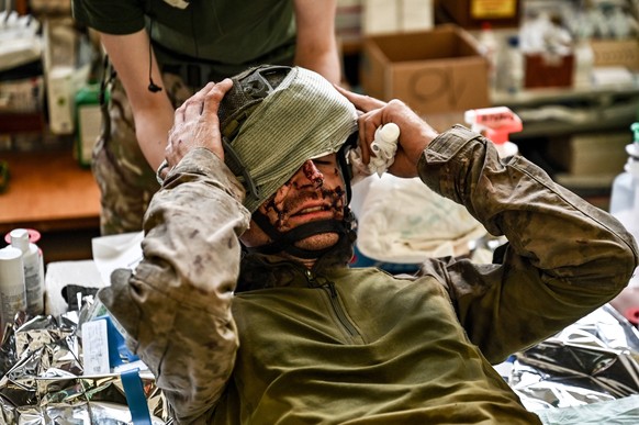 Stabilisation point in Zaporizhzhia Region ZAPORIZHZHIA REGION, UKRAINE - JULY 27, 2023 - A wounded serviceman is pictured at a stabilisation point of the medical service of one of the brigades fighti ...