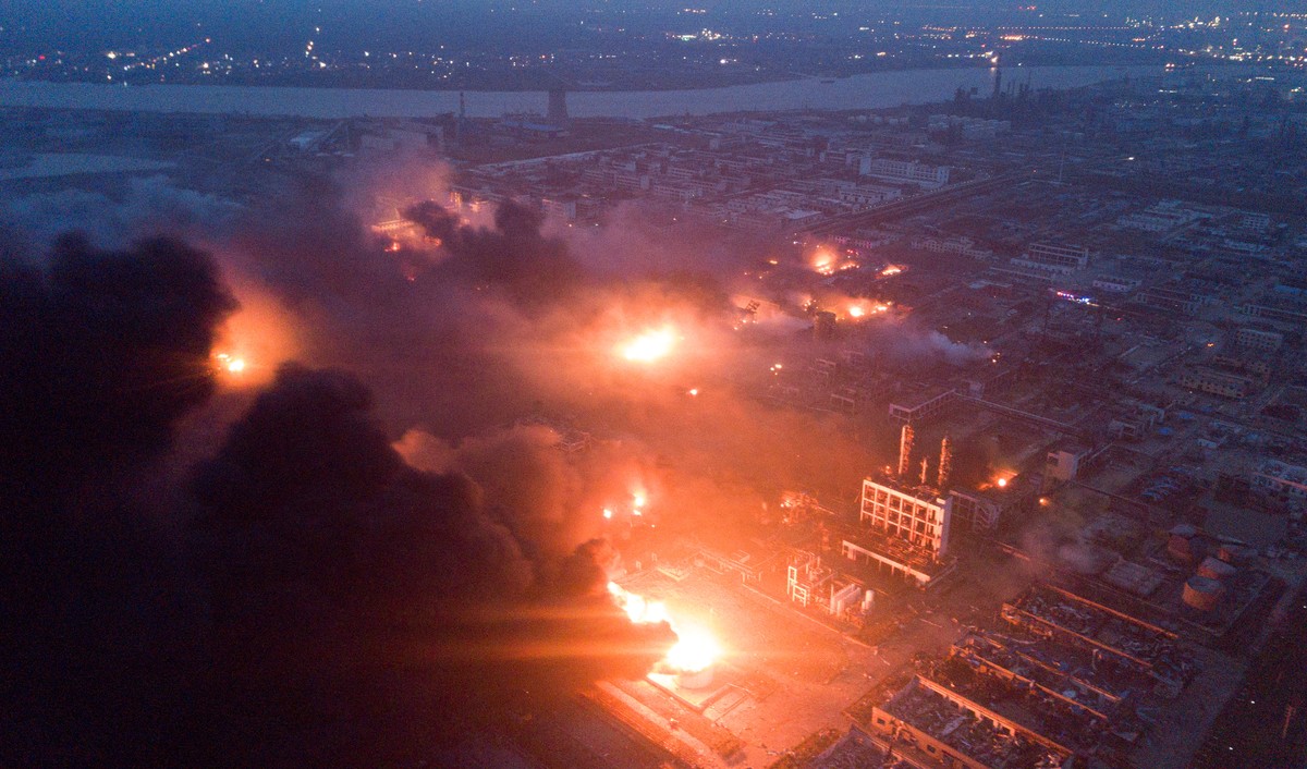 Smoke billows from fire following an explosion at the pesticide plant owned by Tianjiayi Chemical, in Xiangshui county, Yancheng, Jiangsu province, China March 21, 2019. Picture taken March 21, 2019. ...