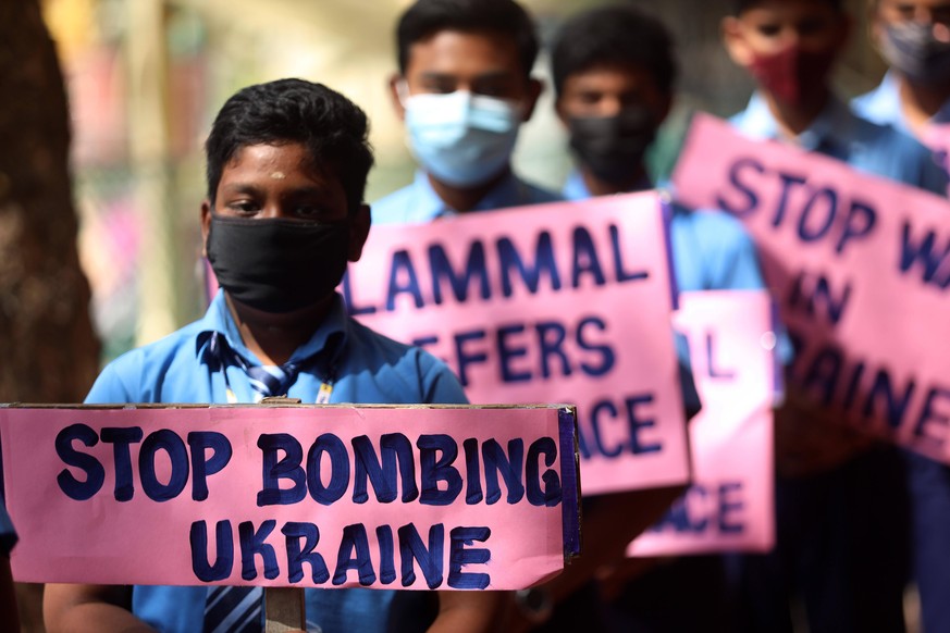 February 25, 2022, Chennai, Tamil Nadu, India: School children carry placards against Russia s military operation in Ukraine, at a school in Chennai. Chennai India - ZUMAl172 20220225_zip_l172_005 Cop ...