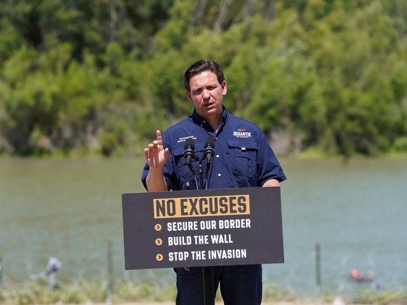 June 26, 2023: Florida Governor and Republican presidential candidate Ron DeSantis speaks during a press conference along the Rio Grande River with Mexico in the background Monday. DeSantis was tourin ...