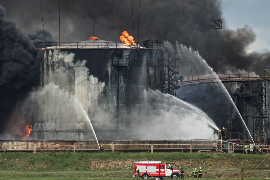 RUSSIA, SEVASTOPOL - APRIL 29, 2023: Firefighters battle a fire at an oil depot in Sevastopol s Kazachya Bukhta neighborhood. According to preliminary data, a fuel tank has caught fire after a drone a ...